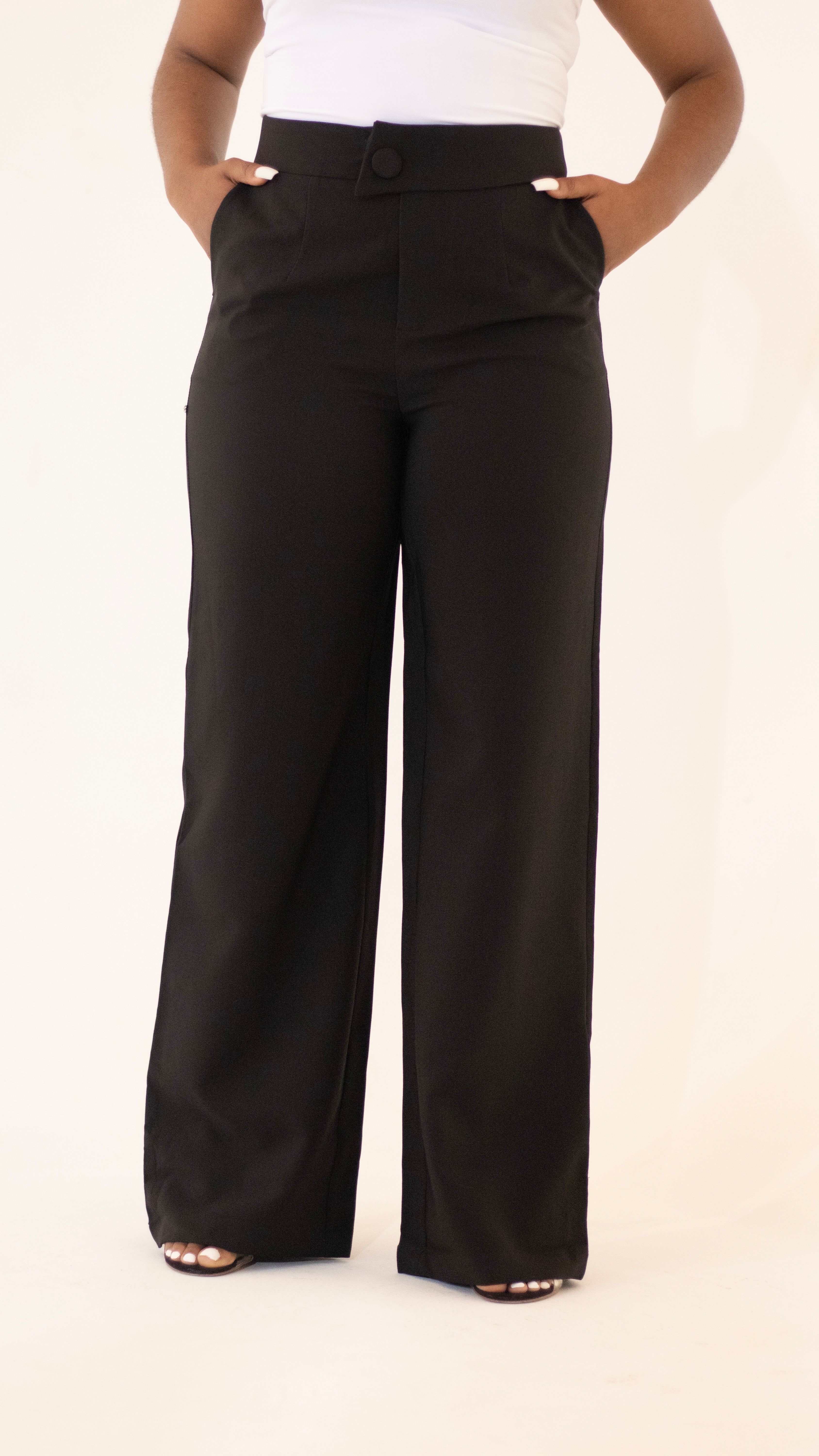 Women's high-waisted black dress pants with pockets