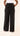 Women's high-waisted black dress pants with pockets