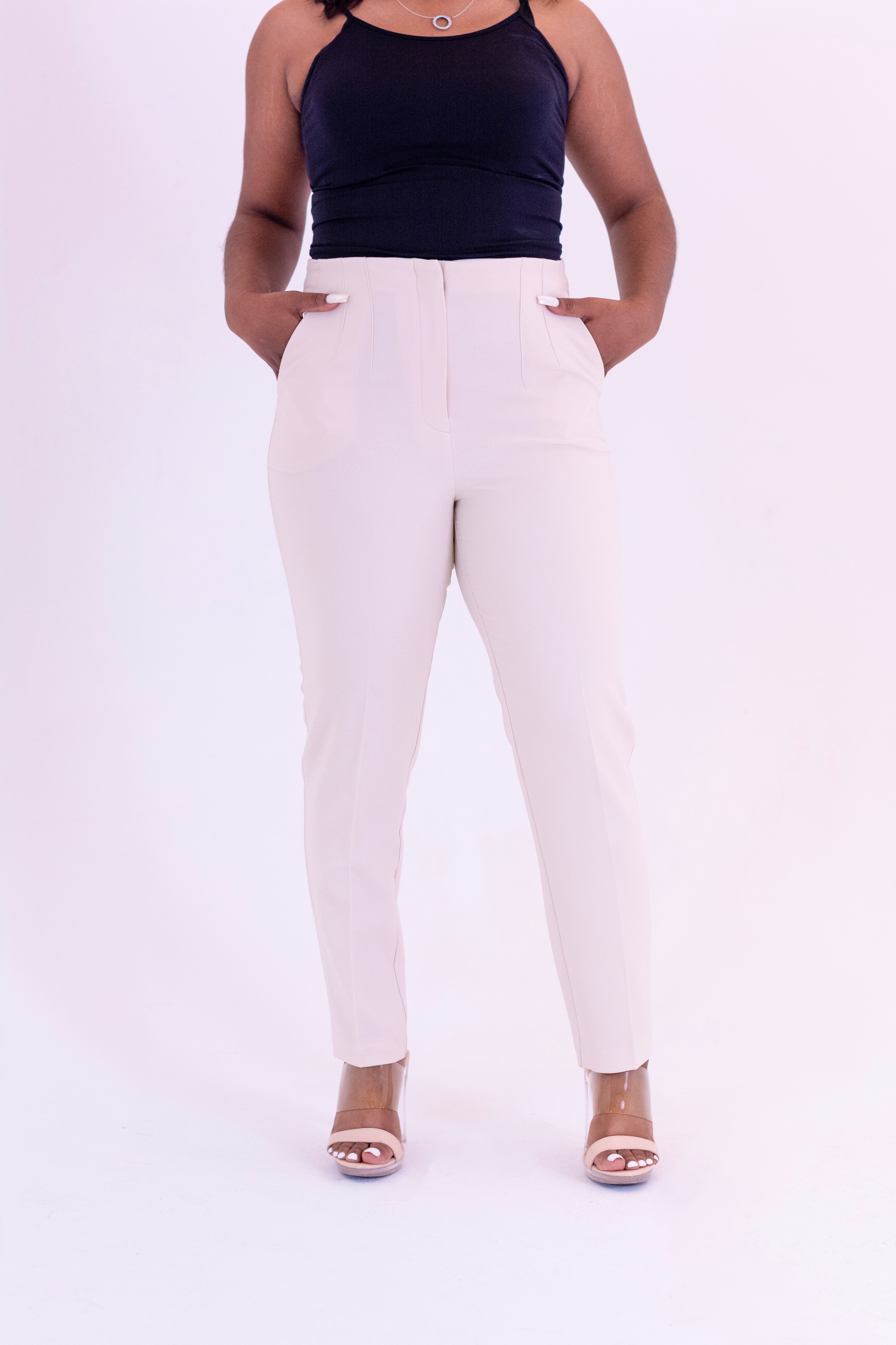 Women's tan/cream colored tailored pants with stretch fit and pockets