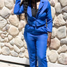 Blue women's suit, tailored pants and blazer