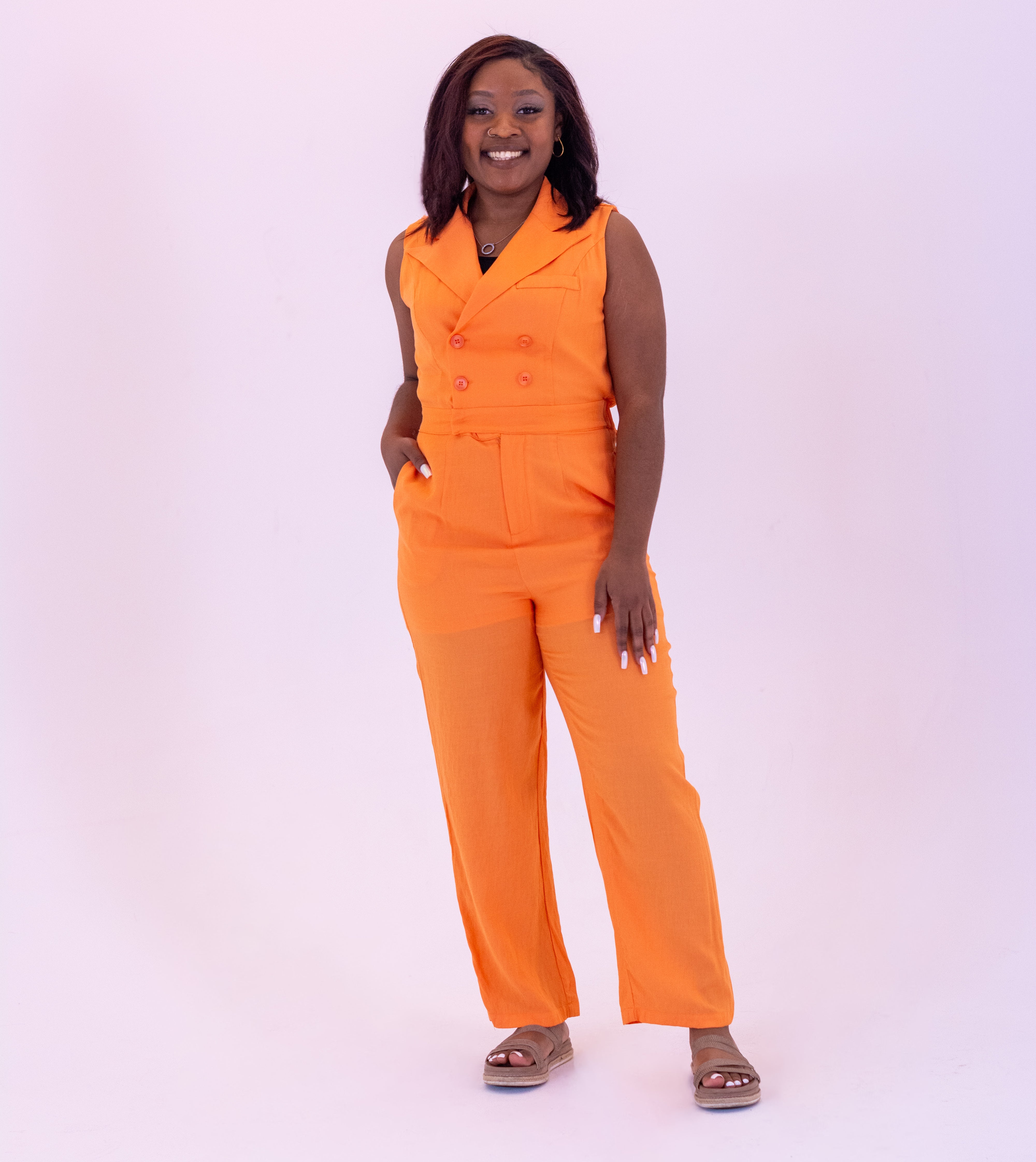 Women's orange jumpsuit with pockets