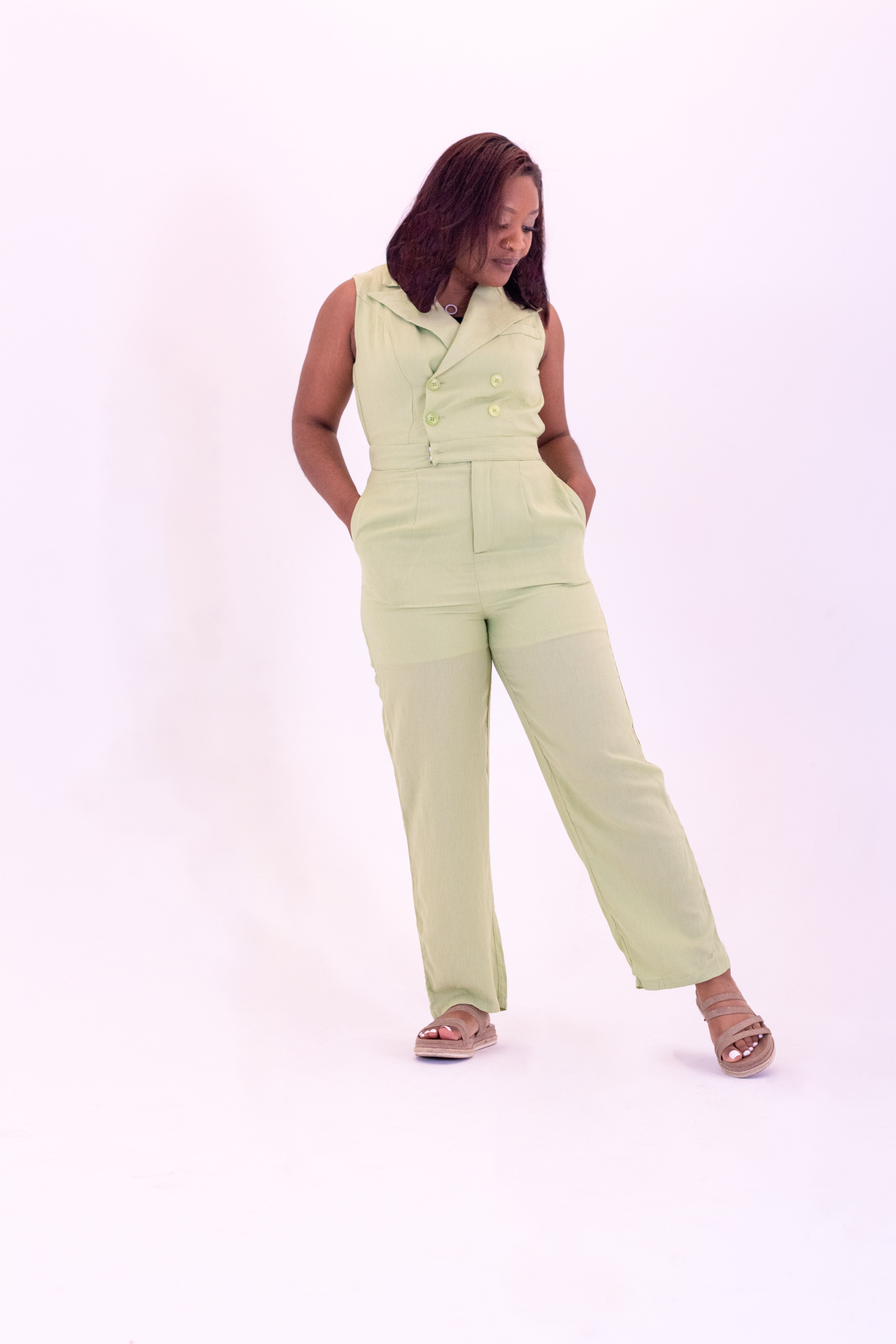 Women's green jumpsuit with pockets